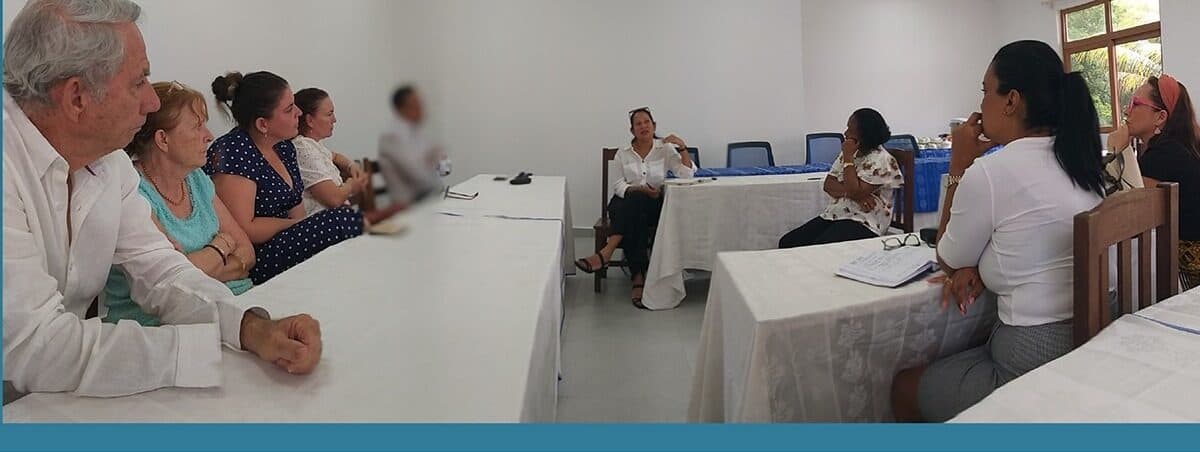 Members seated in a circle of chairs at the Seychelles Tourism Academy consultation meeting.