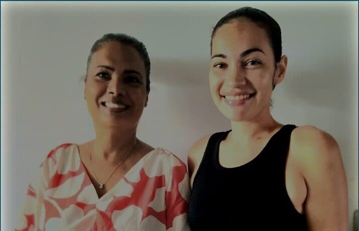 Sheila Sicobo and Neesha Palit standing together, smiling towards the camera.