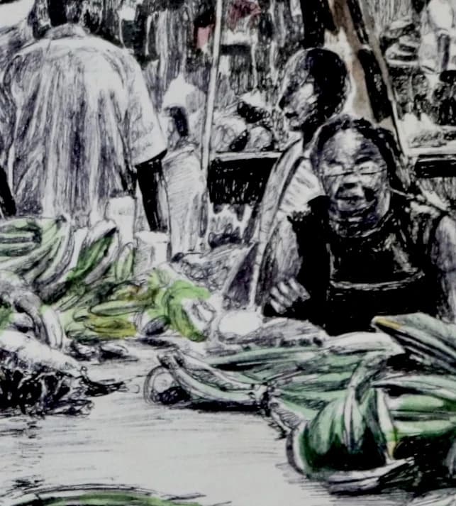 Detail of a market vendor beside fresh produce